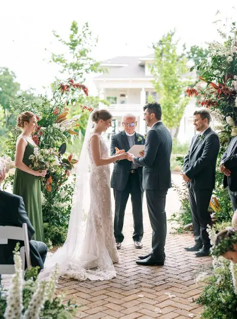 Wedding ceremony, bride and groom exchanging vows.