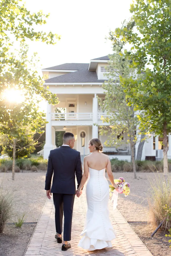 Bride and groom walking away after wedding.