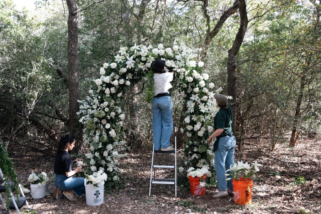 Austin wedding florist designing sustainable floral arrangements at Grand Lady.