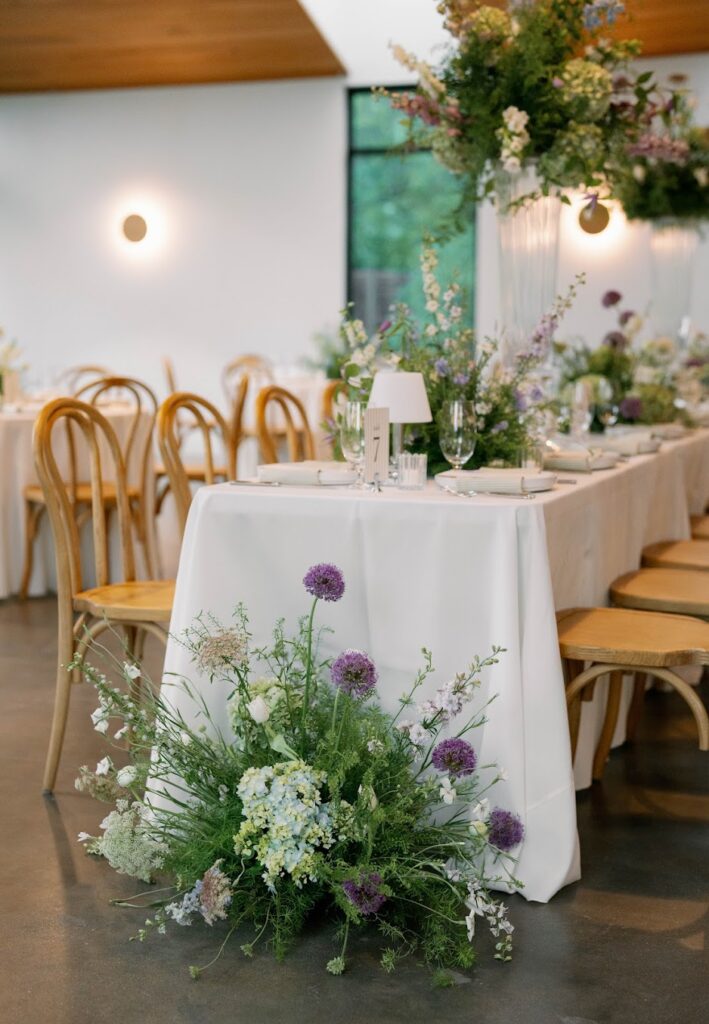 Eco-friendly wedding reception table with sustainable florals at Grand Lady Austin.
