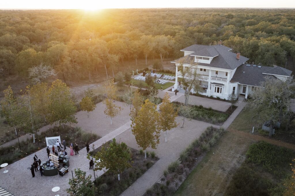Fall wedding at a wedding venue in Austin, TX — evening light at Grand Lady historic mansion.