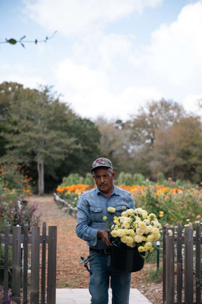 Farm-to-table wedding flowers being harvested at a sustainable wedding venue in Austin, Texas.